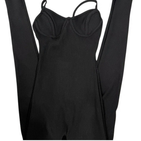 Naked Wardrobe Ribbed Crossback Stirrup Jumpsuit Size Medium in Black NWT - Picture 2 of 3